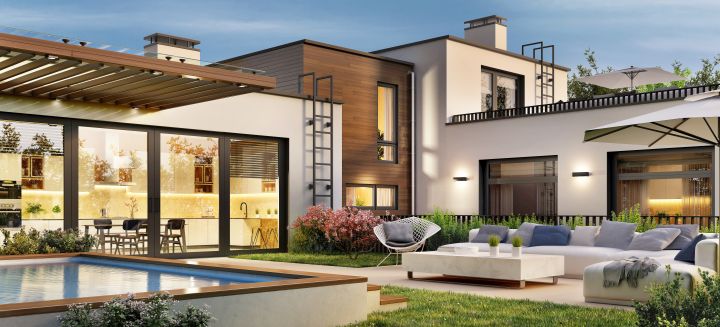 Terrassengestaltung: Großes modernes Haus mit einer modernen Terrasse im Vordergrund und Swimmingpool